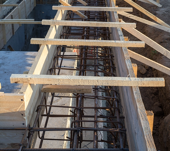 Wooden Framework and Steel Rebar for Foundation Construction by Excavation Contractor